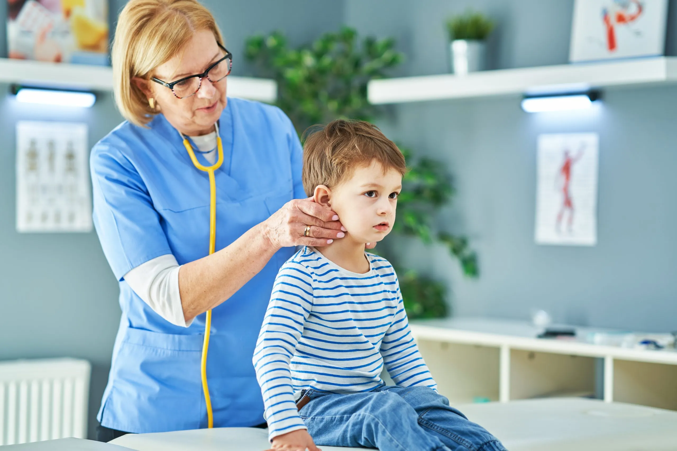 Patient receiving NUCCA upper cervical care for TMJ pain