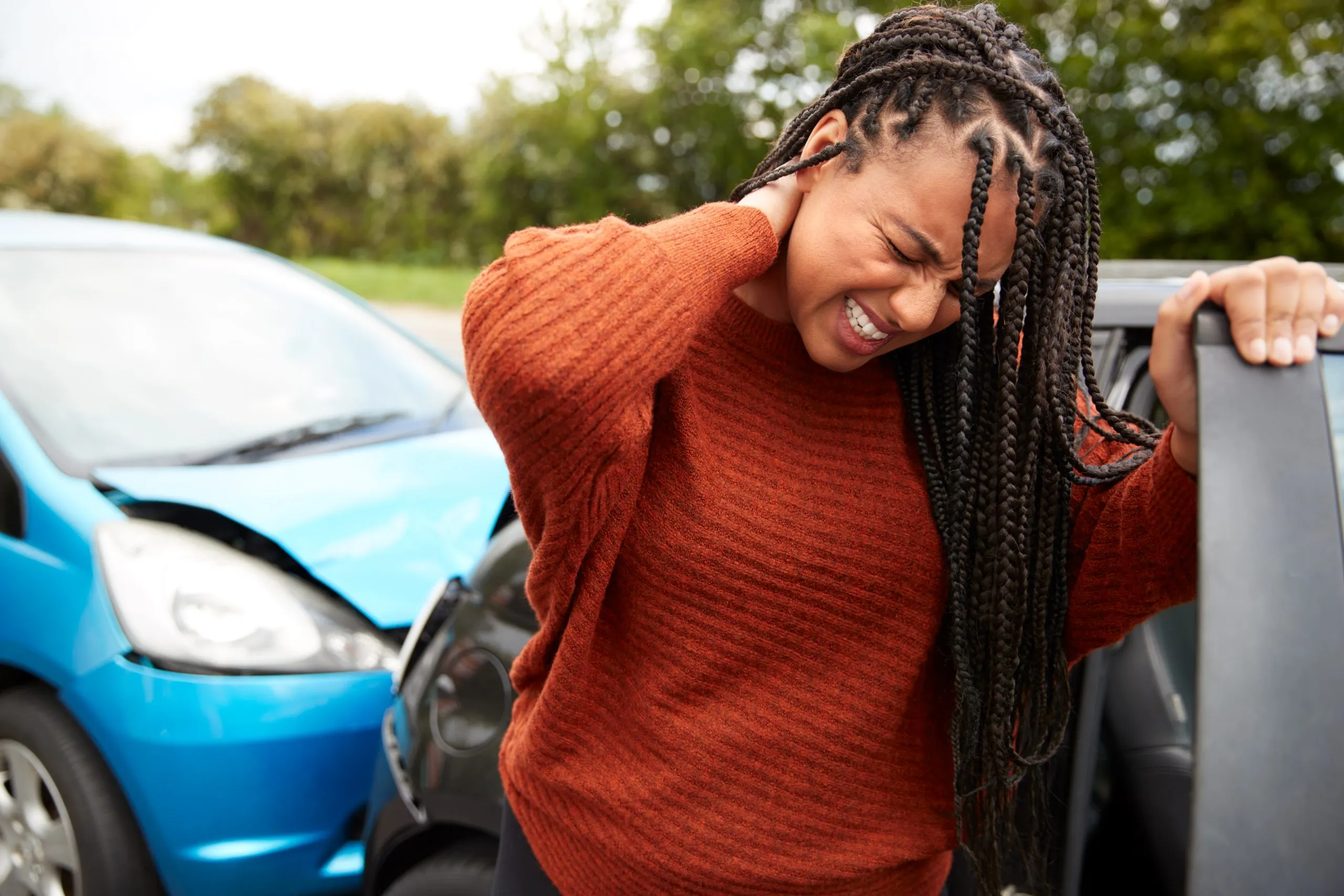 Patient receiving NUCCA upper cervical care for whiplash