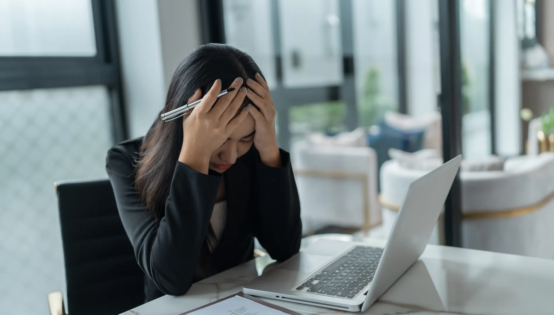 Patient receiving NUCCA upper cervical care for migraine relief