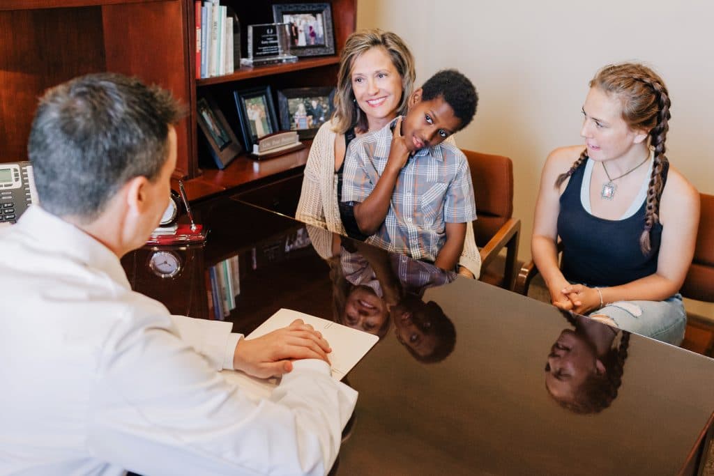 Doctor treating a child patient